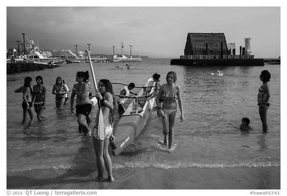 Girls and outrigger canoe, Kailua-Kona. Hawaii, USA