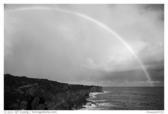 Rainbow over volcanic costline. Big Island, Hawaii, USA (black and white)