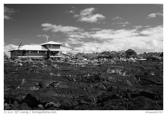 House and recently hardened lava. Big Island, Hawaii, USA (black and white)