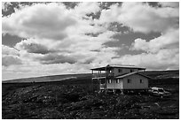 House built over fresh lava fields. Big Island, Hawaii, USA (black and white)
