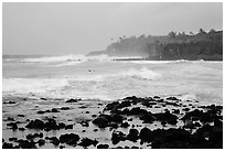 Seascape with strong surf and surfer, Pohoiki. Big Island, Hawaii, USA ( black and white)
