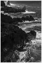 Jagged lava ribs and ocean, MacKenzie State Recreation Area. Big Island, Hawaii, USA ( black and white)
