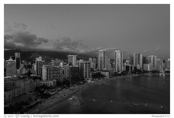 Aerial view of Waikiki Beach and skyline at dusk. Honolulu, Oahu island, Hawaii, USA (black and white)