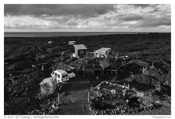 Aerial view of house on lava field, Kalapana. Big Island, Hawaii, USA (black and white)