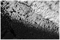 Aerial view of surf and lava rocks looking down, Kaimu Beach. Big Island, Hawaii, USA ( black and white)