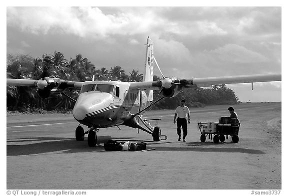 Plane on the airstrip of Ofu Island in 2002. American Samoa (black and white)