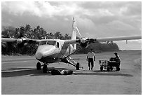 Plane on the airstrip of Ofu Island in 2002. American Samoa ( black and white)