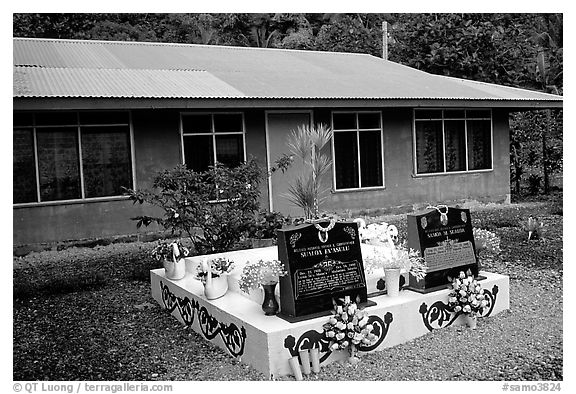 Tombs in front of a home in Faleasao. American Samoa