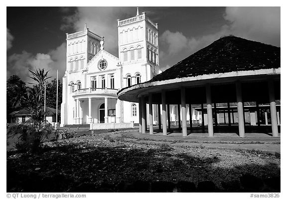 Church and fale in Leone. Tutuila, American Samoa (black and white)