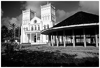 Church and fale in Leone. Tutuila, American Samoa (black and white)