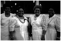 Sunday women churchgoers dressed in white, Pago Pago. Pago Pago, Tutuila, American Samoa (black and white)