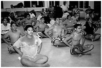 Villagers getting ready for traditional dance, Aua. Tutuila, American Samoa (black and white)