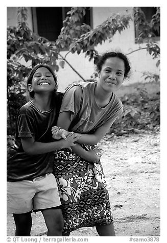 Girls in Aunuu village. Aunuu Island, American Samoa (black and white)
