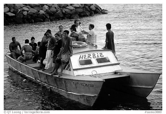 Villagers crowd a ferry to Aunuu. Aunuu Island, American Samoa