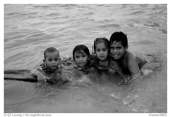 Children in the water. Tutuila, American Samoa