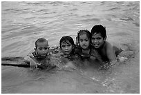 Children in the water. Tutuila, American Samoa (black and white)