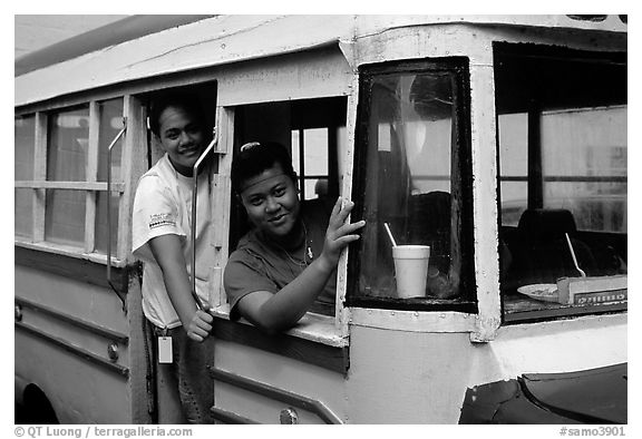 Women in a colorful bus. Pago Pago, Tutuila, American Samoa (black and white)