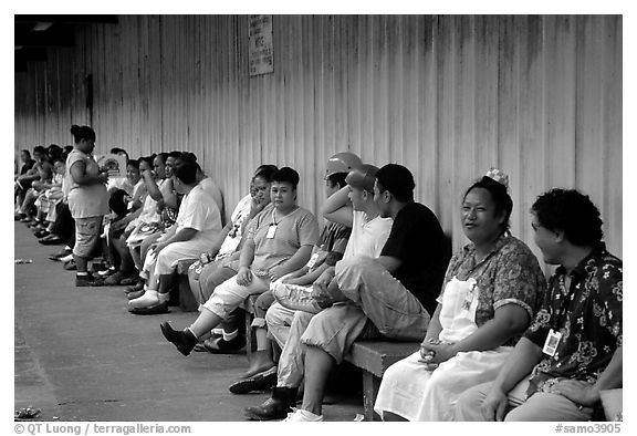 Workers of the tuna factory during a break. Pago Pago, Tutuila, American Samoa (black and white)