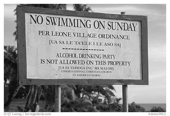 Sign prohibiting activities on Sunday. Tutuila, American Samoa (black and white)