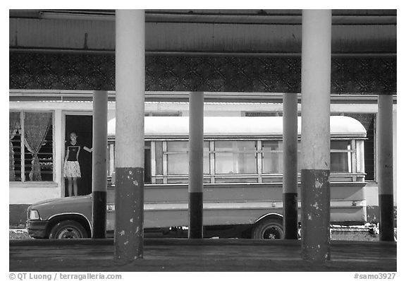 Bus and fale in Masefau village. Tutuila, American Samoa (black and white)