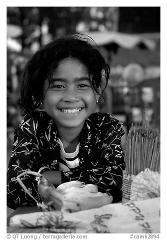 Young incense vendor. Phnom Penh, Cambodia (black and white)