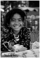 Young incense vendor. Phnom Penh, Cambodia ( black and white)
