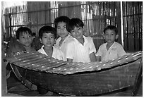 Boys with a traditional musical instrument. Phnom Penh, Cambodia ( black and white)