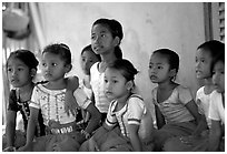 Girls learn traditional singing at  Apsara Arts  school. Phnom Penh, Cambodia (black and white)