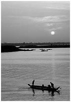 Boat and sunrise, Tonle Sap,  Phnom Phen. Cambodia (black and white)