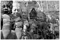 Statues near the gates of the temple complex. Angkor, Cambodia (black and white)