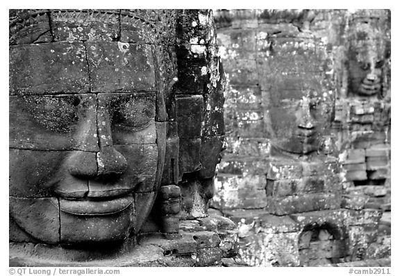 Serene and massive stone faces, the Bayon. Angkor, Cambodia