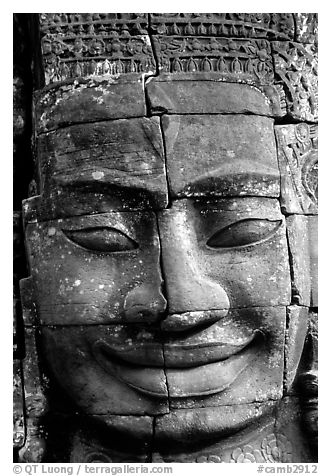 Enigmatic stone smiling face, the Bayon. Angkor, Cambodia