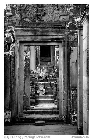 Buddhist monks in the Bayon. Angkor, Cambodia (black and white)