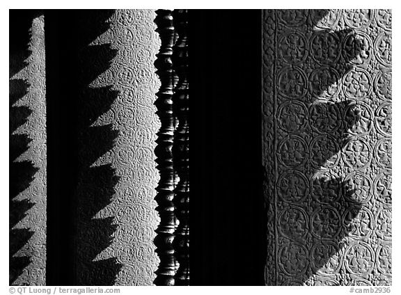 Shadow patterns of circular columns projected on wall, Angkor Wat. Angkor, Cambodia (black and white)