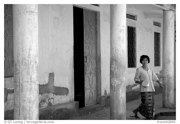 Woman in downtown building. Phnom Penh, Cambodia (black and white)