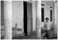 Woman in downtown building. Phnom Penh, Cambodia (black and white)