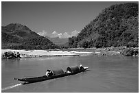 Narrow live-in boat. Mekong river, Laos (black and white)