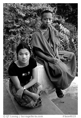 Buddhist novice monk and his sister. Luang Prabang, Laos