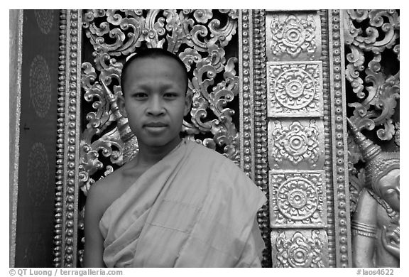 Buddhist novice monk at Wat Xieng Thong. Luang Prabang, Laos (black and white)