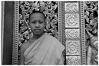 Buddhist novice monk at Wat Xieng Thong. Luang Prabang, Laos (black and white)