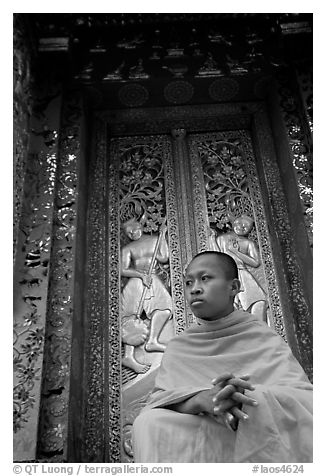 Buddhist novice monk at Wat Xieng Thong. Luang Prabang, Laos (black and white)