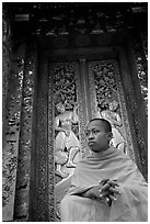 Buddhist novice monk at Wat Xieng Thong. Luang Prabang, Laos (black and white)