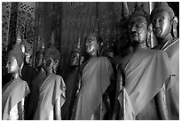 Drapped Buddha statues, Wat Xieng Thong. Luang Prabang, Laos (black and white)