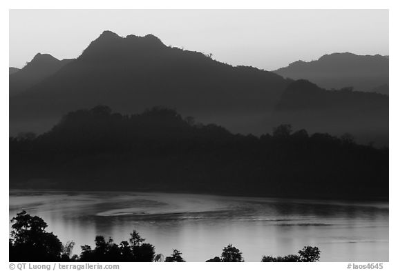 Hills, sunset on the Mekong river. Luang Prabang, Laos (black and white)