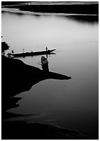 Boats, sunset on the Mekong river, Luang Prabang. Mekong river, Laos ( black and white)