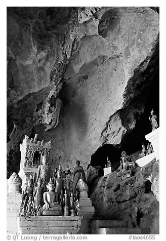 Novice Buddhist monk in  Tham Ting cave,  Pak Ou. Laos