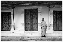 Novice Buddhist monk at Wat Pakkhan. Luang Prabang, Laos (black and white)