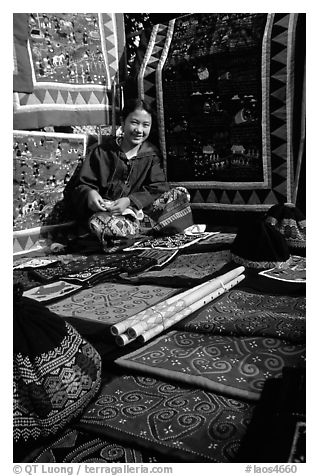 Young woman sells crafts on market. Luang Prabang, Laos