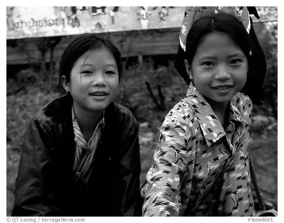 Two young girls at the market. Luang Prabang, Laos