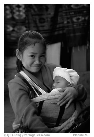 Girl and baby, Ban Xang Hai. Laos (black and white)